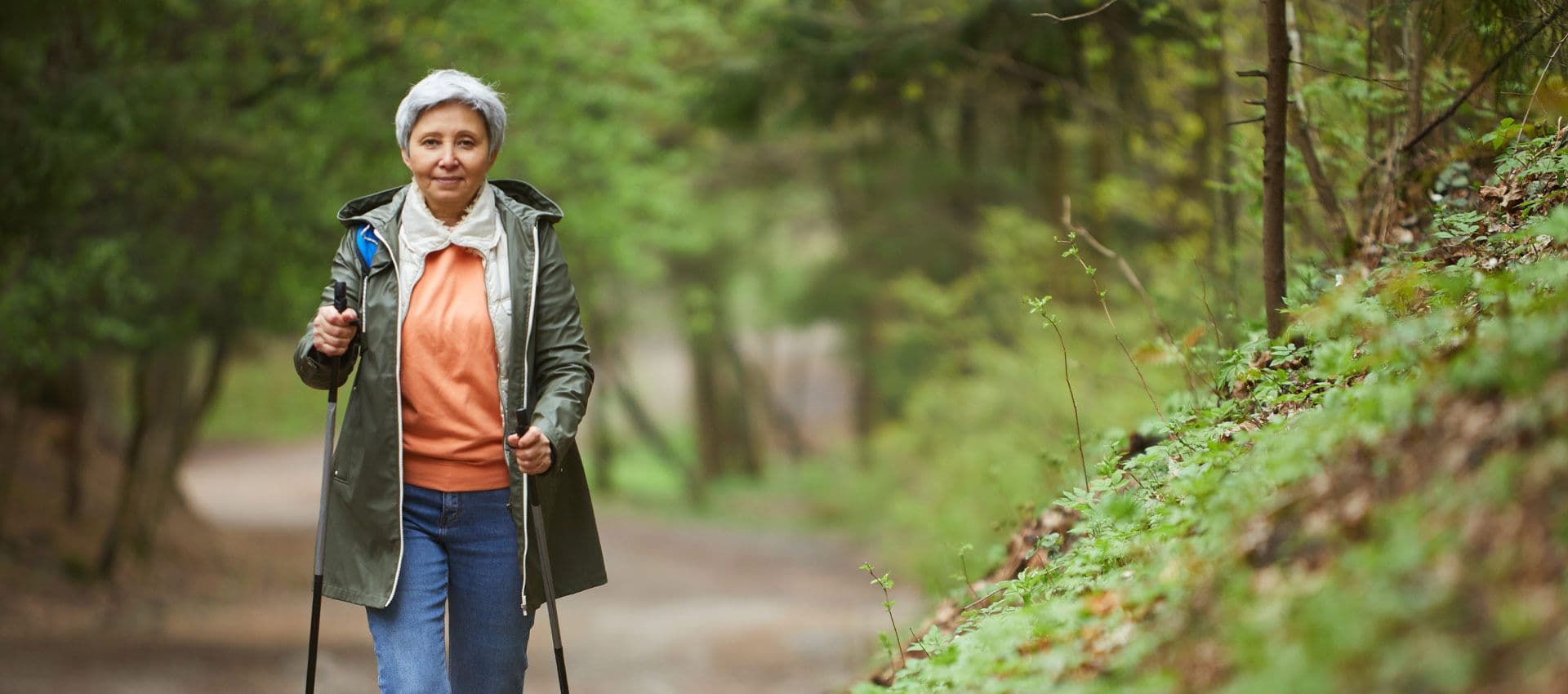 A woman walking through the woods